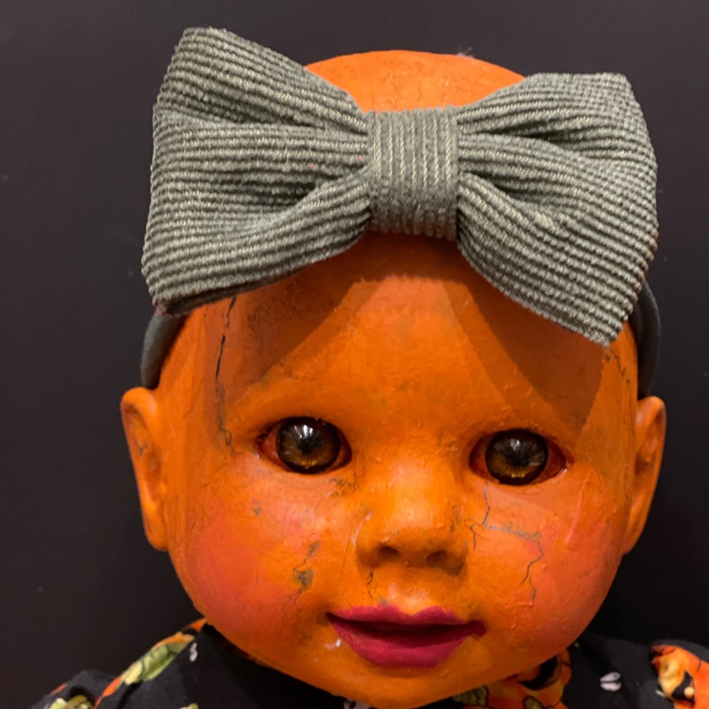 Creepy Pumpkin Doll Augustina is up for adoption.